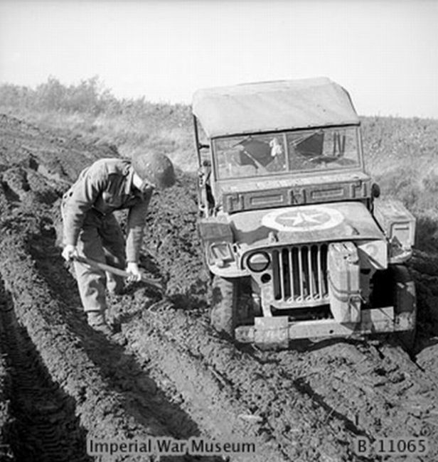 11th Armoured Division digging out his jeep 19 October 1944