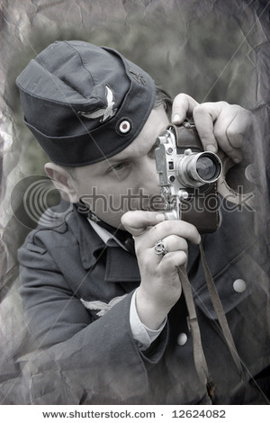 stock-photo-german-soldier-with-camera-ww-reenacting-12624082