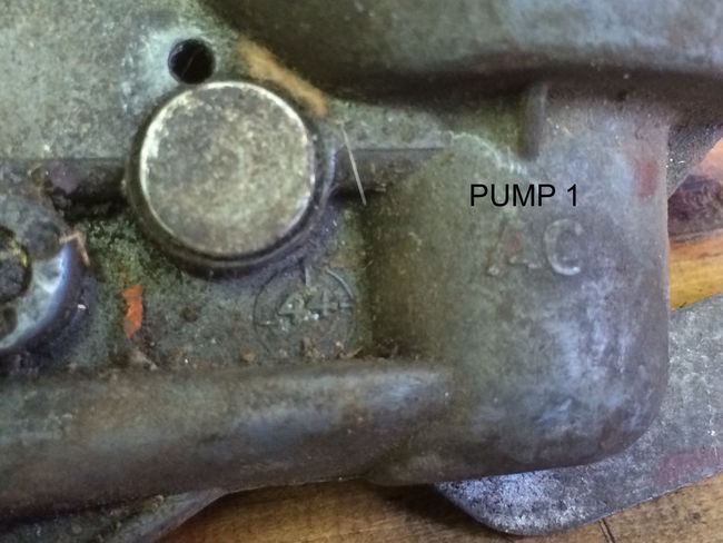 a large group of jeep and Gm wartime dated fuel pumps for sale.