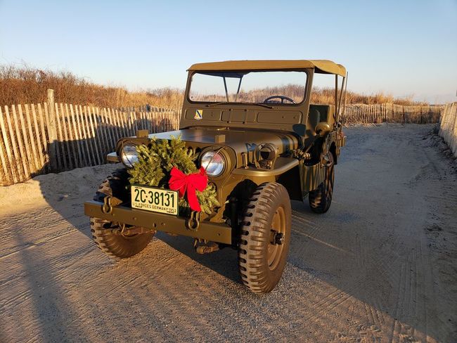 1952 Willys M38 at the beach with X-Mas Wreath