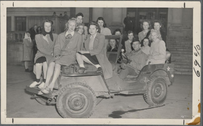 Delta_Zeta_sorority_sisters_posing_in_an_Army_Jeep_after_finishing_second_i