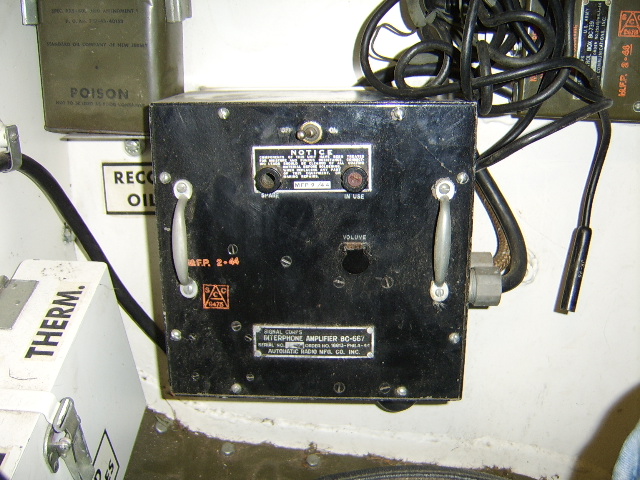 interphone amplifier on L/H side of fighting compartment