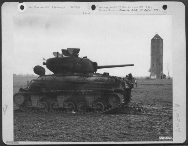 Knocked out Sherman Tank. Blatzheim, Germany.