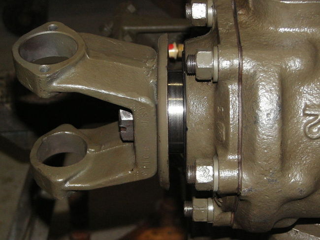 Universal yoke and seal housing