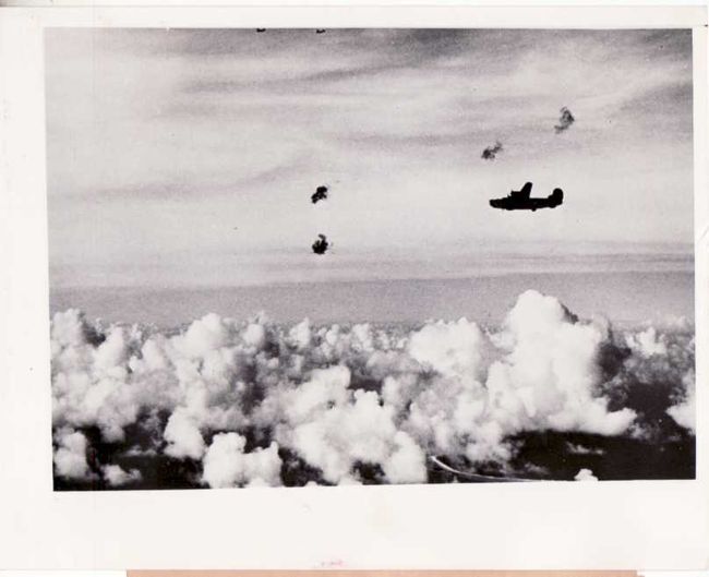 B-24 flying through flak.