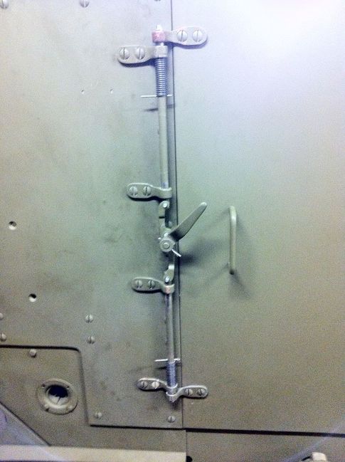 Rear door latch system