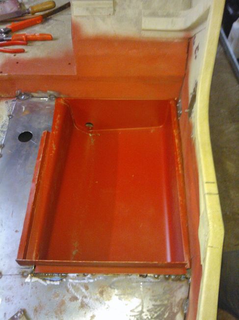 Fuel tank well