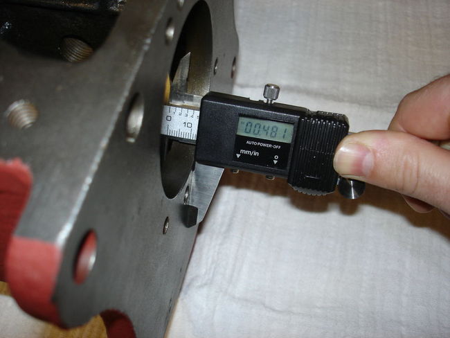 Front thrust surface thickness