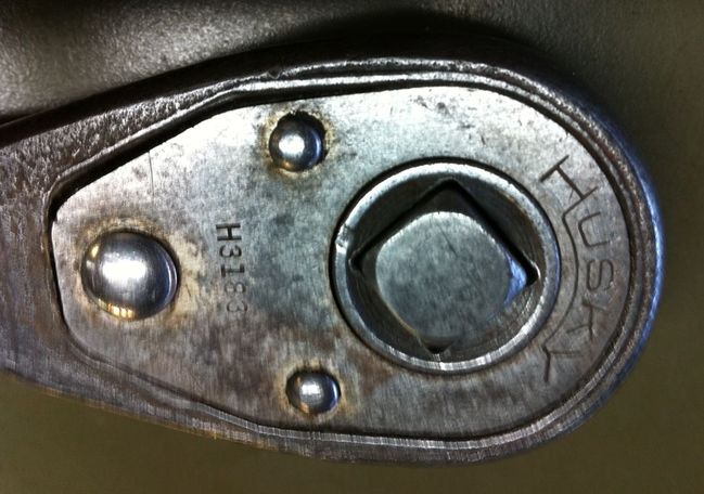 Husky non-reversing ratchet markings