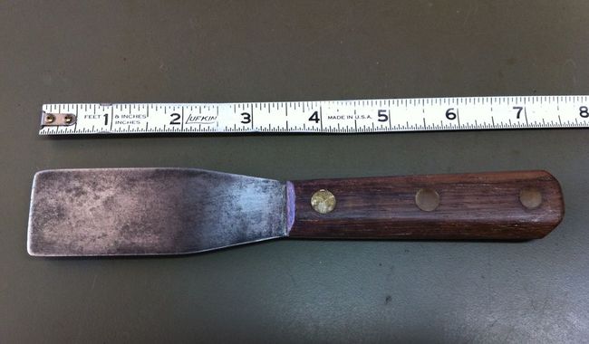 Rusty putty knife after cleaning