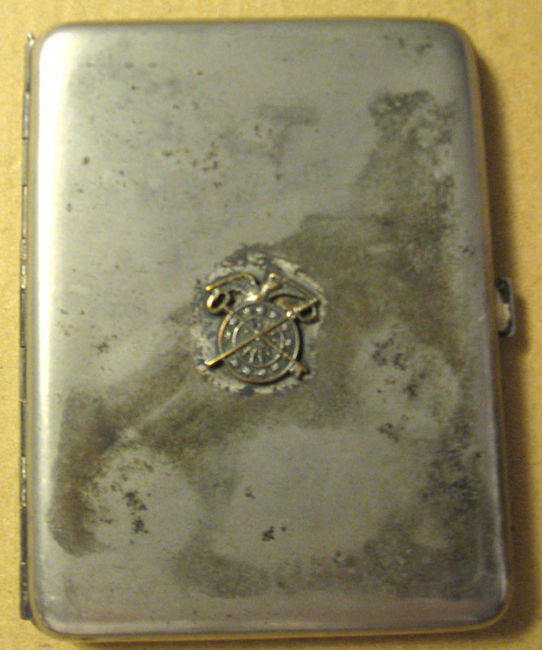 QM cigarette case outside