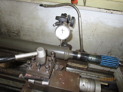 Straightening front drive shaft.