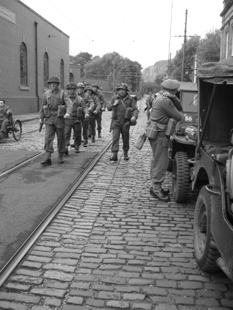 Maching past the Jeeps