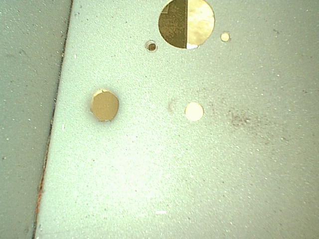 Jeep_bullet_hole_from_inside