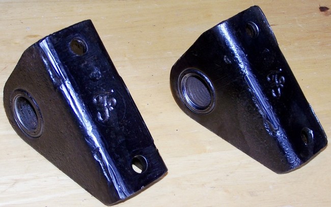 Frame shackle holder