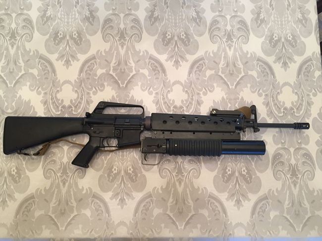 M203