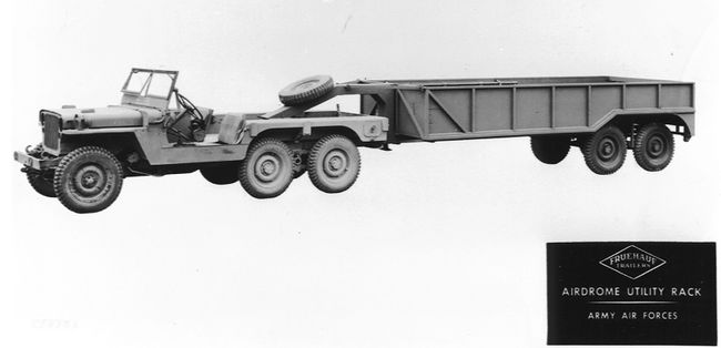 TUG towing Jeep Trailer