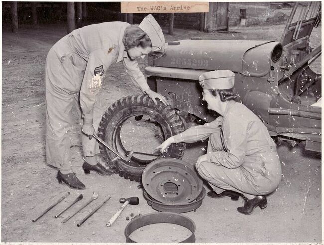 WAC’s repairing jeep tire