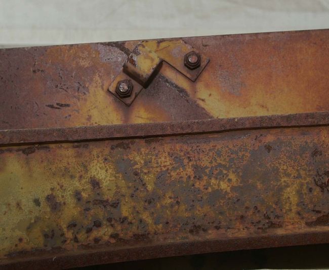 Unrestored Scout Car drivers side bracket distant