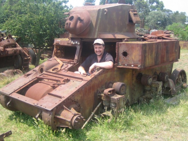 Bill sitting in a Stuart Tank.