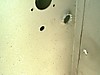 Jeep_bullet_hole_1.JPG