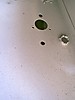 Jeep_bullet_hole_next_to_dimmer_switch.JPG