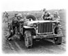 Jeep_with_guys_pushing_it_up_a_hill.JPG
