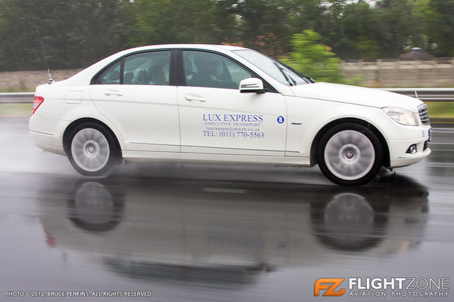 Mercedes in the Rain Lux Express Executive Transport