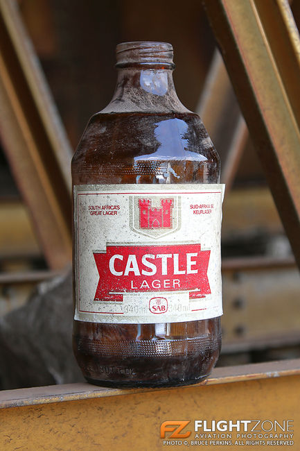 Castle Lager Dumbie found in wing of ZS-DVJ